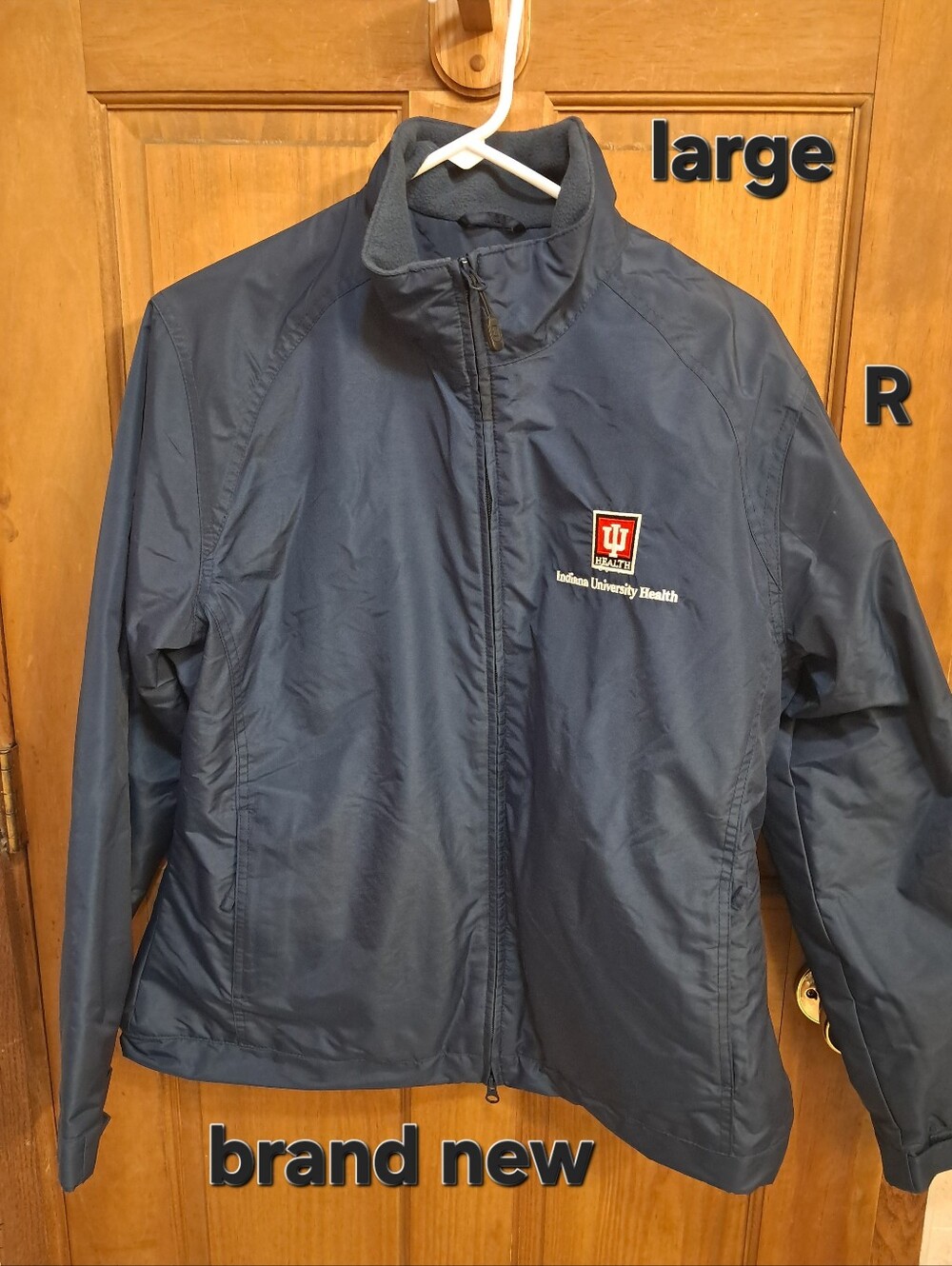 Port Authority Navy Windbreaker with Indiana University Health Logo's Brand New